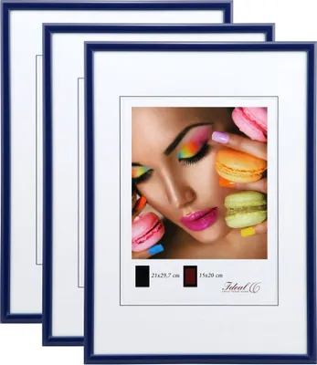 Three blue picture frames are stacked on top of each other, with the front frame displaying a close-up image of a woman's face with colorful makeup and macarons.
