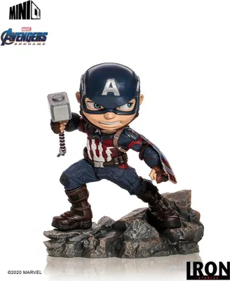 A collectible figurine of Captain America from Avengers: Endgame, holding Mjolnir and his shield, posed on a rocky base.