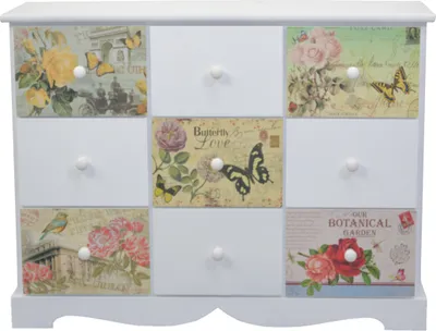 A white dresser with nine drawers, each decorated with vintage-style postcards featuring flowers and butterflies.
