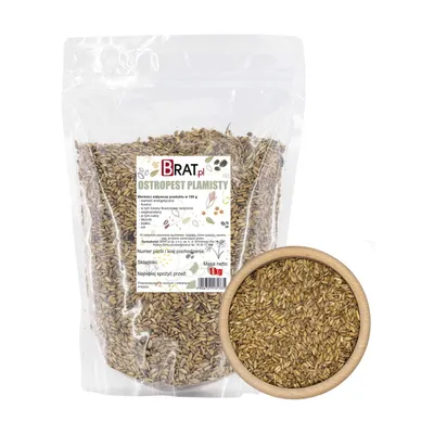 A bag of milk thistle seeds next to a wooden bowl filled with the seeds.