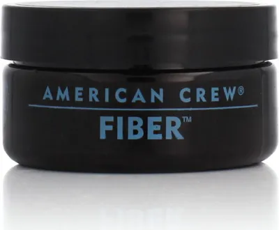A black jar of American Crew Fiber hair product is shown against a white background.