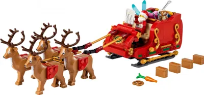 Image de LEGO Santa's Sleigh, jouet pour enfant à construire : Minifigure, 4 figurines de rennes et guitare, Père Noël et idée cadeau de Noël pour 9 ans, pour garçon et fille, 40499