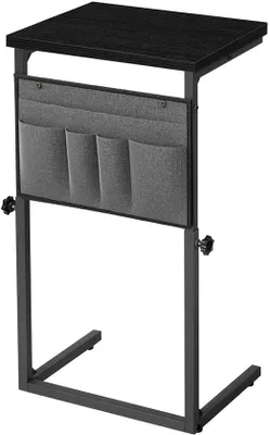Imagen del producto de Mesa auxiliar ajustable Unyqoos® de 50–75 cm con estante y bolsillos laterales tipo Oxford, estructura de metal y tablero de madera, capacidad de carga de 10 kg – ideal para salones, dormitorios y baños