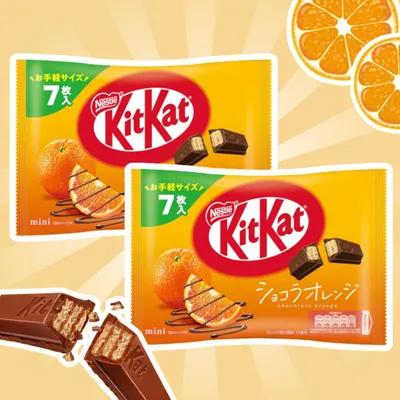 Produktbild von 2x Kit Kat Mini Orange – Knusprige Schokoladen-Waffeln mit erfrischendem Orangenaroma (2x81.2g) +Heartforcards Versandschutz