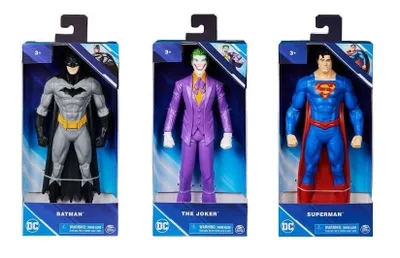 Three action figures in their packaging: Batman, The Joker, and Superman.