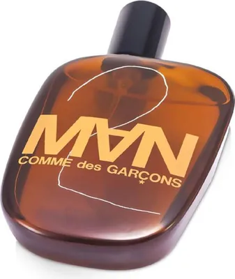 A brown glass bottle of Comme des Garcons MAN 2 Eau de Toilette.