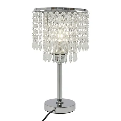 A crystal pendant table lamp with a silver base and stem, set against a white background.
