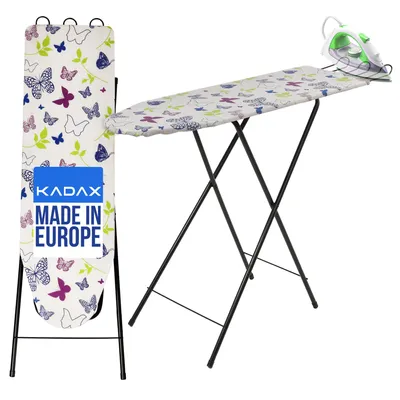 An ironing board with a butterfly pattern and an iron on top, shown in a studio setting.
