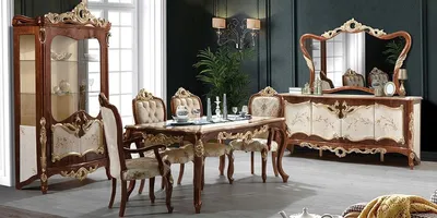 Produktbild von Casa Padrino Luxus Barock Esszimmer Set Cremefarben / Braun / Gold - 1 Esstisch & 6 Esszimmerstühle & 1 Vitrine & 1 Sideboard mit Wandspiegel - Barock Esszimmer Möbel - Edel & Prunkvoll