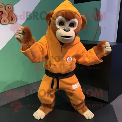 Produktbild von Orangefarbener REDBROKOLY Kapuziner-Affen Maskottchen Kostüm charakter bekleidet mit einem Sweatshirt und Gürteln