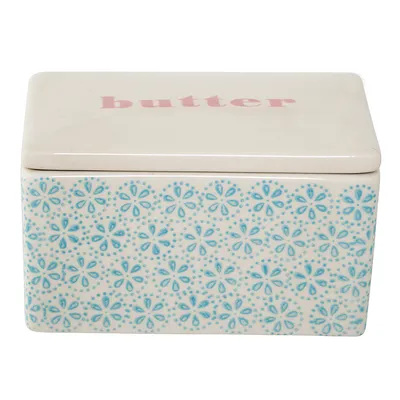 A ceramic butter dish with a lid.