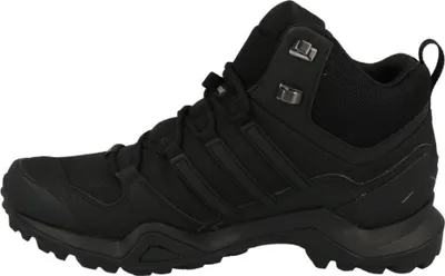 A side view of a black Adidas Terrex hiking boot.