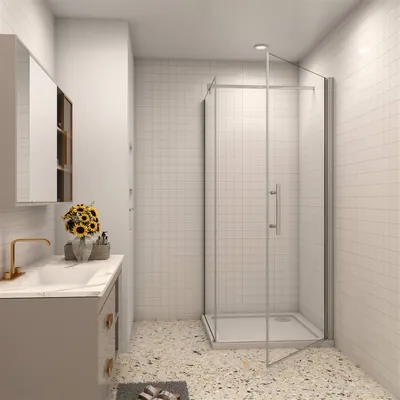 A modern bathroom with a shower cabin and a vanity.