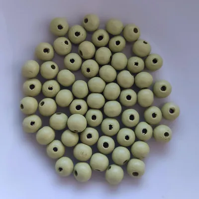 Zdjęcie produktu dla Koraliki drewniane, okrągłe, 60 sztuk, 10 mm, jasnozielone