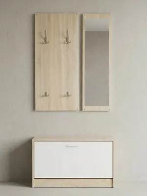 Kompakte Flurgarderobe Salerno frontal freigestellt. Das Set besteht aus einem Wandpaneel mit zehn Haken, einem schmalen Spiegel und einem bodenstehenden Schuhschrank in Holzoptik und Weiß._#sku_BARWL5.165#