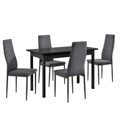 A black dining table with four gray upholstered chairs, presented against a white background.