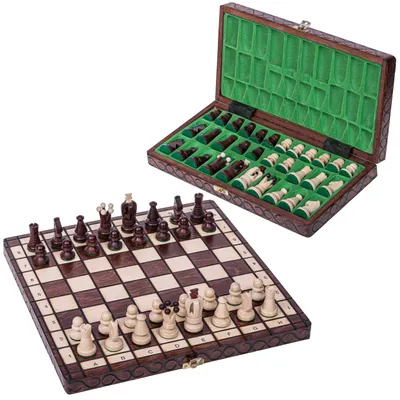 A wooden chess set with pieces on the board and in the open case.