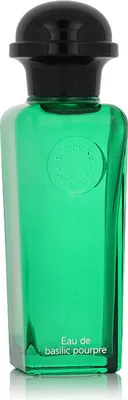 A product shot of a green perfume bottle with a black cap.