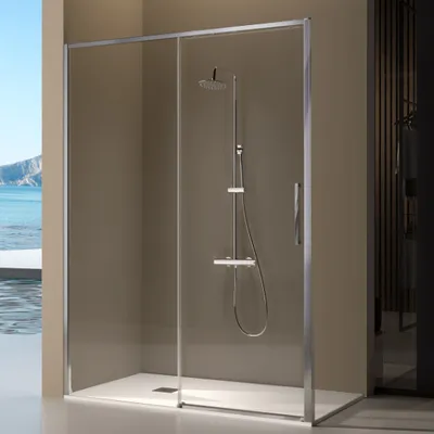 A modern shower enclosure with a sliding door, featuring a shower head and controls, set against a backdrop that suggests a bathroom with a view of the sea.