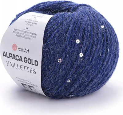 A ball of blue yarn with silver sequins, with a label attached.