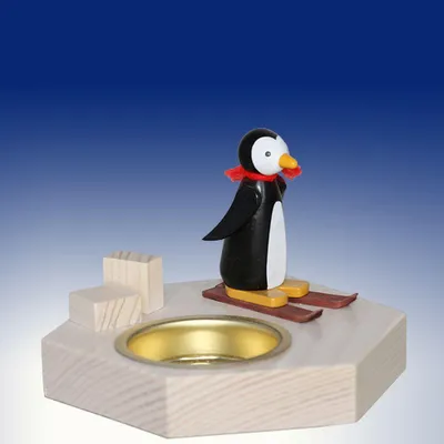 Produktbild von Weihnachtsdekoration Teelichthalter Pinguin auf Ski bunt BxHxT 6,5x6,5x6,5cm NEU