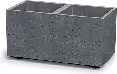 A gray, rectangular planter with two compartments, made of a material that resembles concrete.