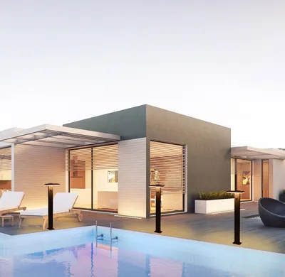 A modern house with a swimming pool and outdoor lighting.