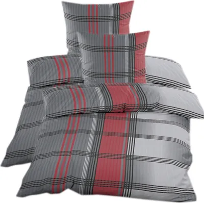 A stack of bedding with a plaid pattern.