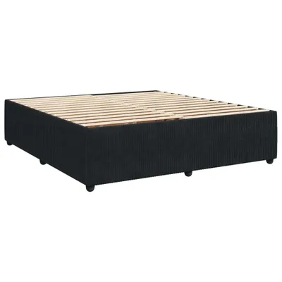 A bed frame with a slatted base.
