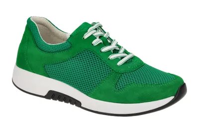 A studio shot of a green sneaker.