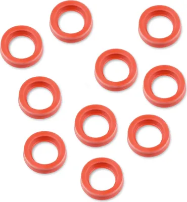 A collection of red O-rings arranged in a scattered pattern on a white background.
