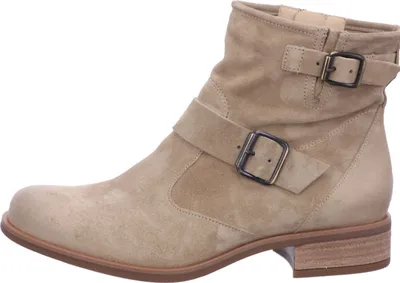 A single beige suede boot with buckles, shown from the side against a white background.