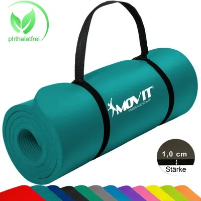A rolled-up teal yoga mat with a black carrying strap and the brand logo. A row of colorful mats is visible at the bottom.