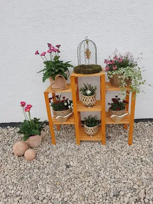Produktbild von Blumenetagerie aus Holz „Heilbronn“ 98 x 32 x 88 cm honigfarben