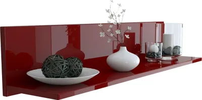 A red high-gloss shelf with decorative items.