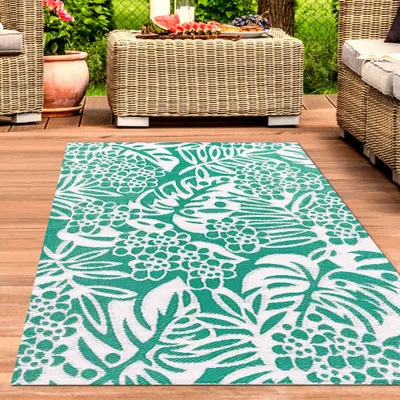 Produktbild von Wasserfester Outdoor-Teppich mit tropischem Design in petrol Größe - 180 x 280 cm