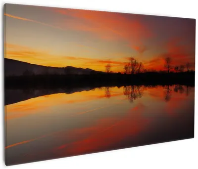 Produktbild von Wallario Premium Leinwandbild Abendrot am Himmel über einem See in Größe 60 x 90 cm