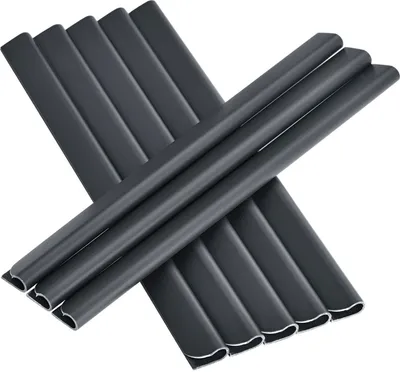 Several dark grey PVC privacy strips are arranged in an X shape against a white background.