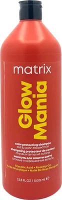 A red bottle of Matrix Glow Mania shampoo with yellow text.