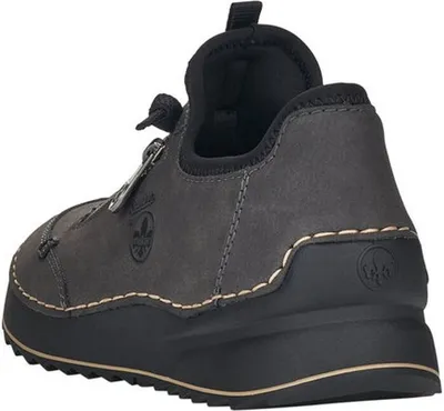 Rear view of a gray sneaker with a black sole.