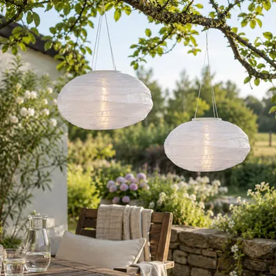 Produktbild von LED Solar Lampions oval - warmweiße LED - H: 19cm - D: 35cm - Lichtsensor - weiß - 2er Set