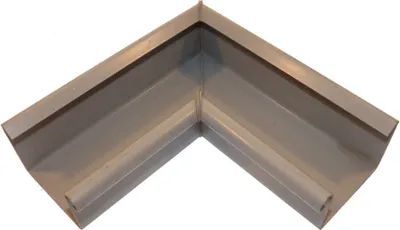 A 90-degree corner piece for a gutter system.