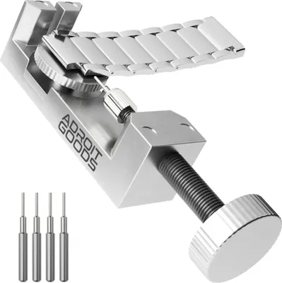 A watch band adjustment tool with extra pins.