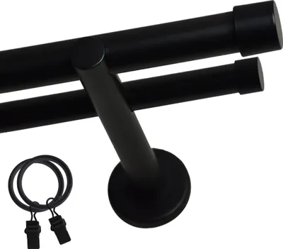 A close-up, studio shot of a black double curtain rod with two rings and clips.