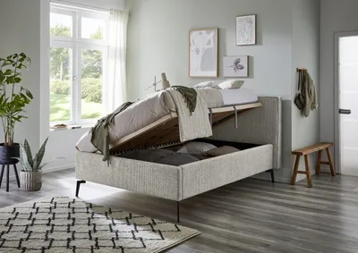 Produktbild von Meise Möbel Stauraumbett Riva 140x200 cm | Doppelbett | Bettkasten & Lattenrost (Federholzrahmen) | Webstoff Beigegrau | Metallfuß schwarz