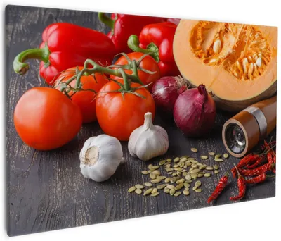 Produktbild von Wallario Premium Leinwandbild Kürbissuppe - Zutaten mit Tomaten, Knoblauch, Zwiebeln und Pfeffer in Größe 60 x 90 cm