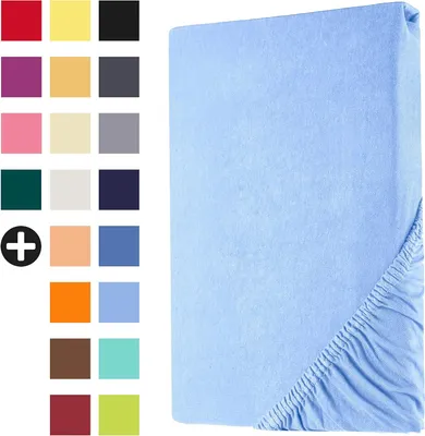 A collection of color swatches and a light blue fitted sheet.