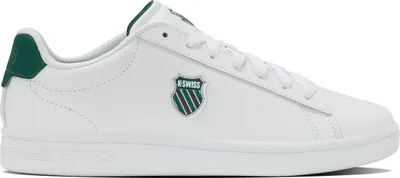 A white K-Swiss sneaker with green accents.