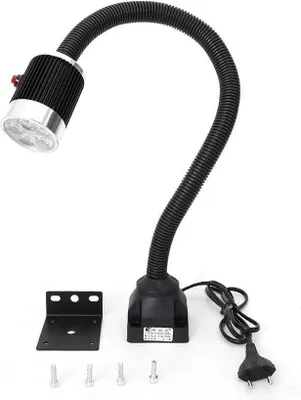 A machine lamp with a flexible gooseneck and a base, along with mounting hardware and screws, is displayed against a white background.