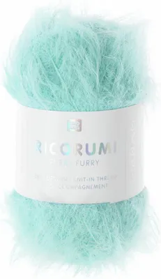 A ball of fluffy turquoise yarn with a label.